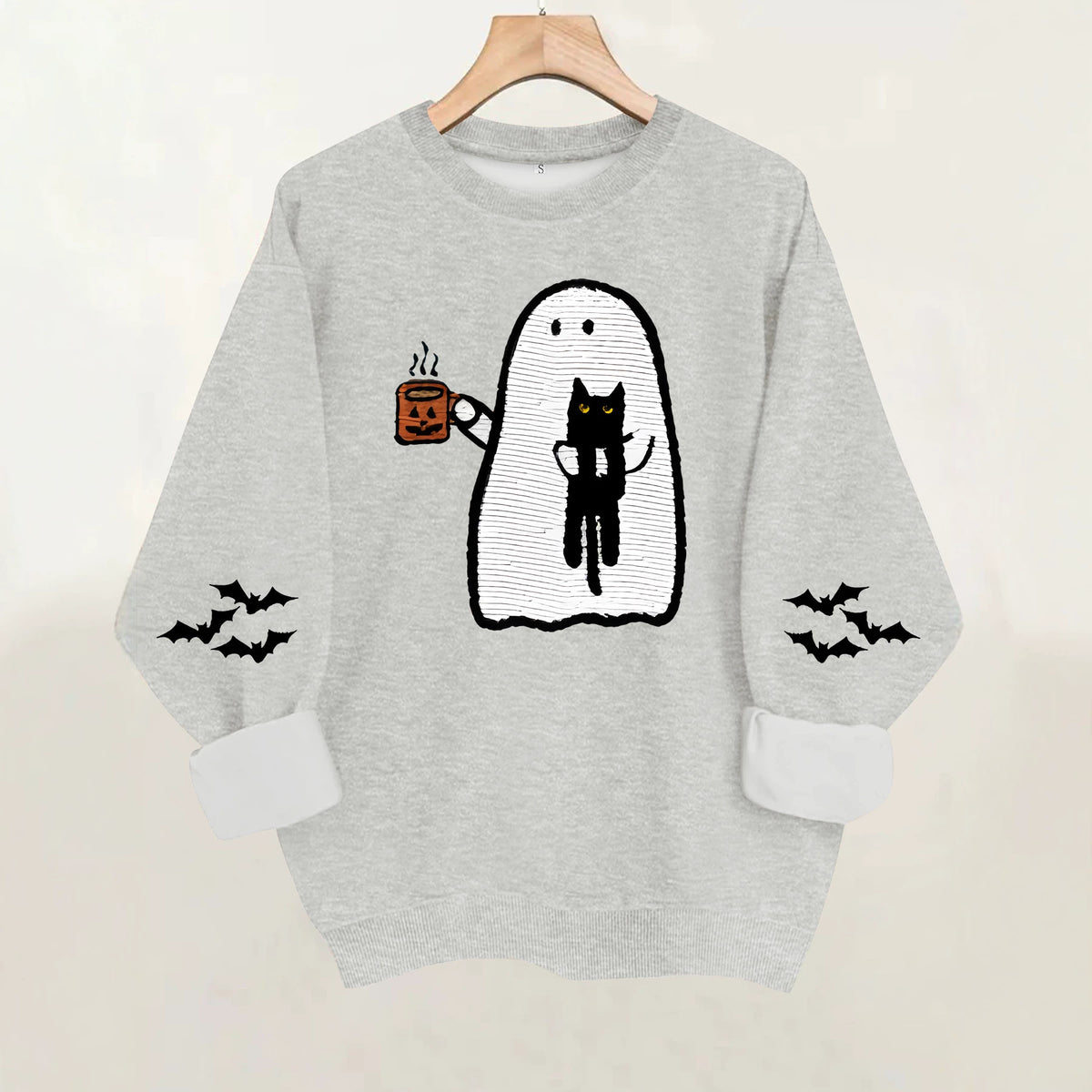 Ghost holding black cat with fleece hoodie